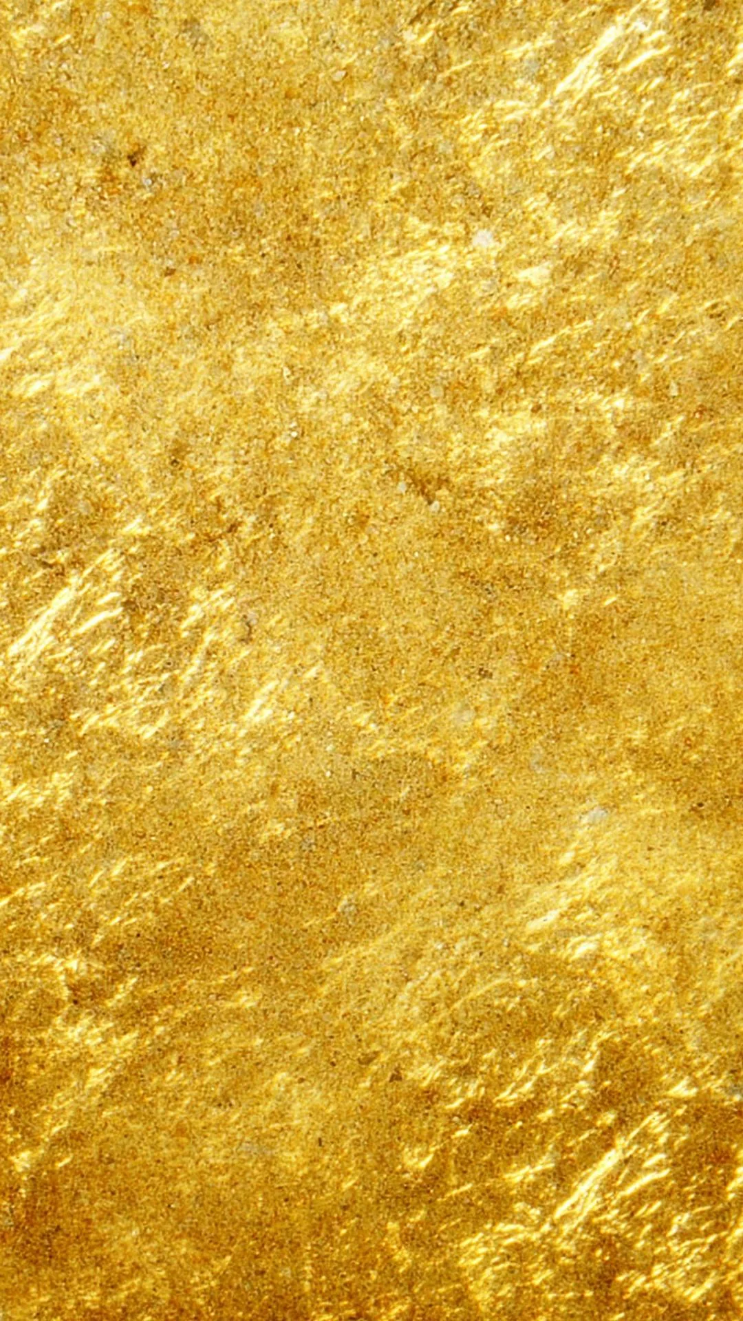 Hammered gold leaf running the full height of a phone screen, its even crumple leaving no single focal point to fight the clock.