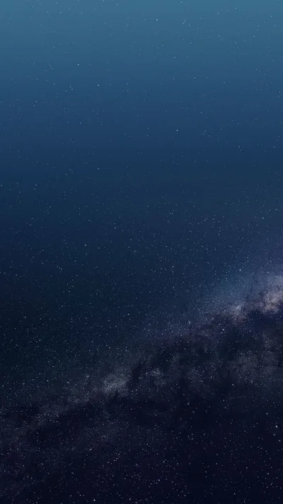 A band of the Milky Way crosses the lower third of a deep blue sky, leaving the starfield above smooth enough for a clock.