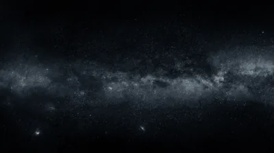 The galactic band stretches flat across the middle of the frame in cool grey, with two small satellite smudges low on the left and the top third left almost empty.