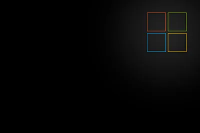 Four hollow squares outlined in red, green, blue and yellow sit in the top right corner of a soft black gradient, the rest left clear for icons.