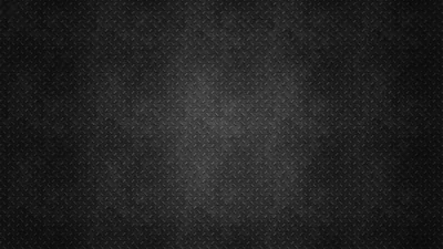 A repeating diamond stitch covers the whole panel in dark grey, brightest through a vertical band down the centre and heavy at the corners.