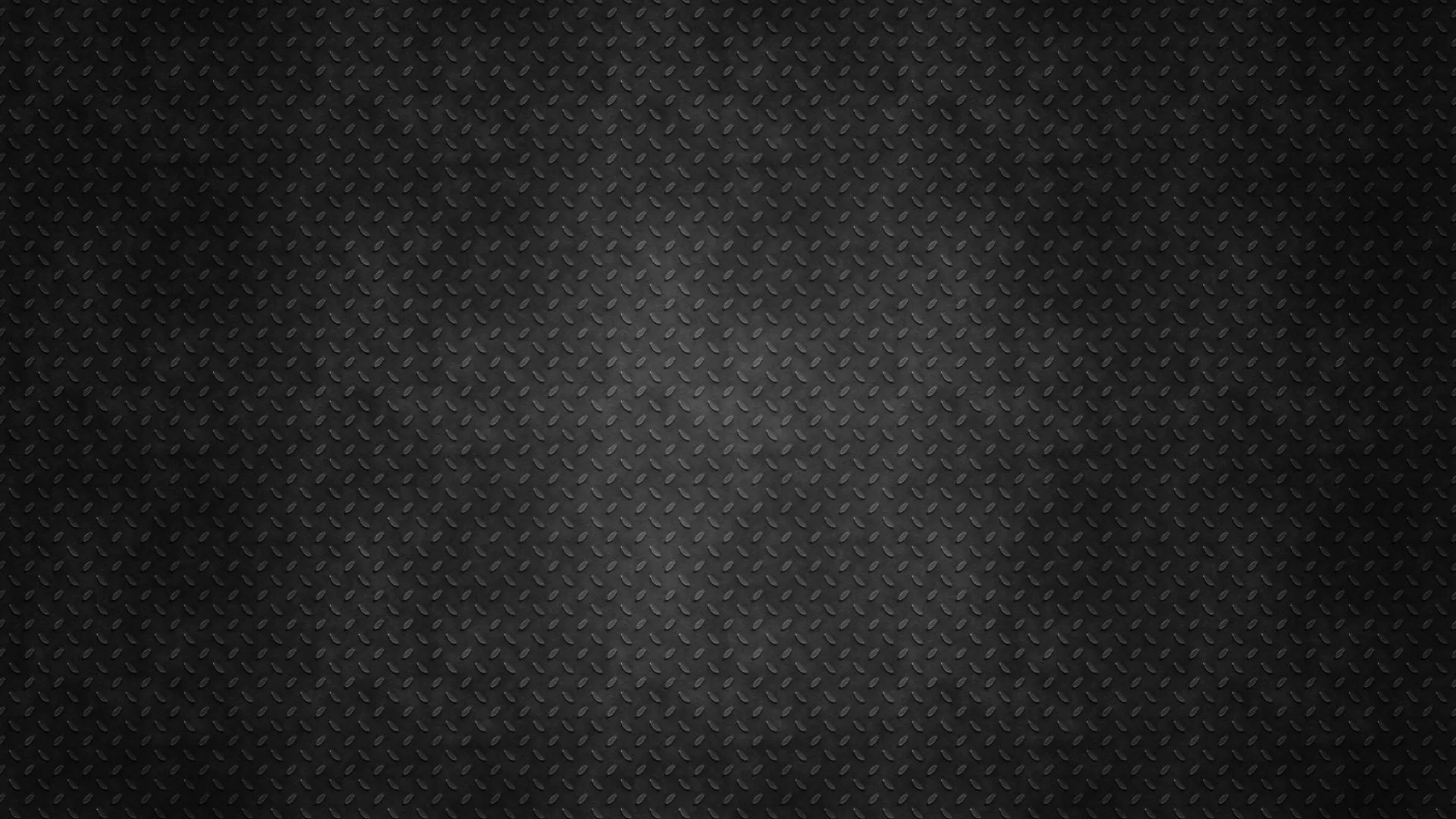 A repeating diamond stitch covers the whole panel in dark grey, brightest through a vertical band down the centre and heavy at the corners.