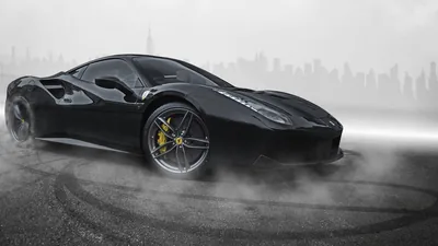 Tyre smoke pours off the rear of a gloss black coupe as it slides across wet asphalt, a faint city skyline showing through the haze.