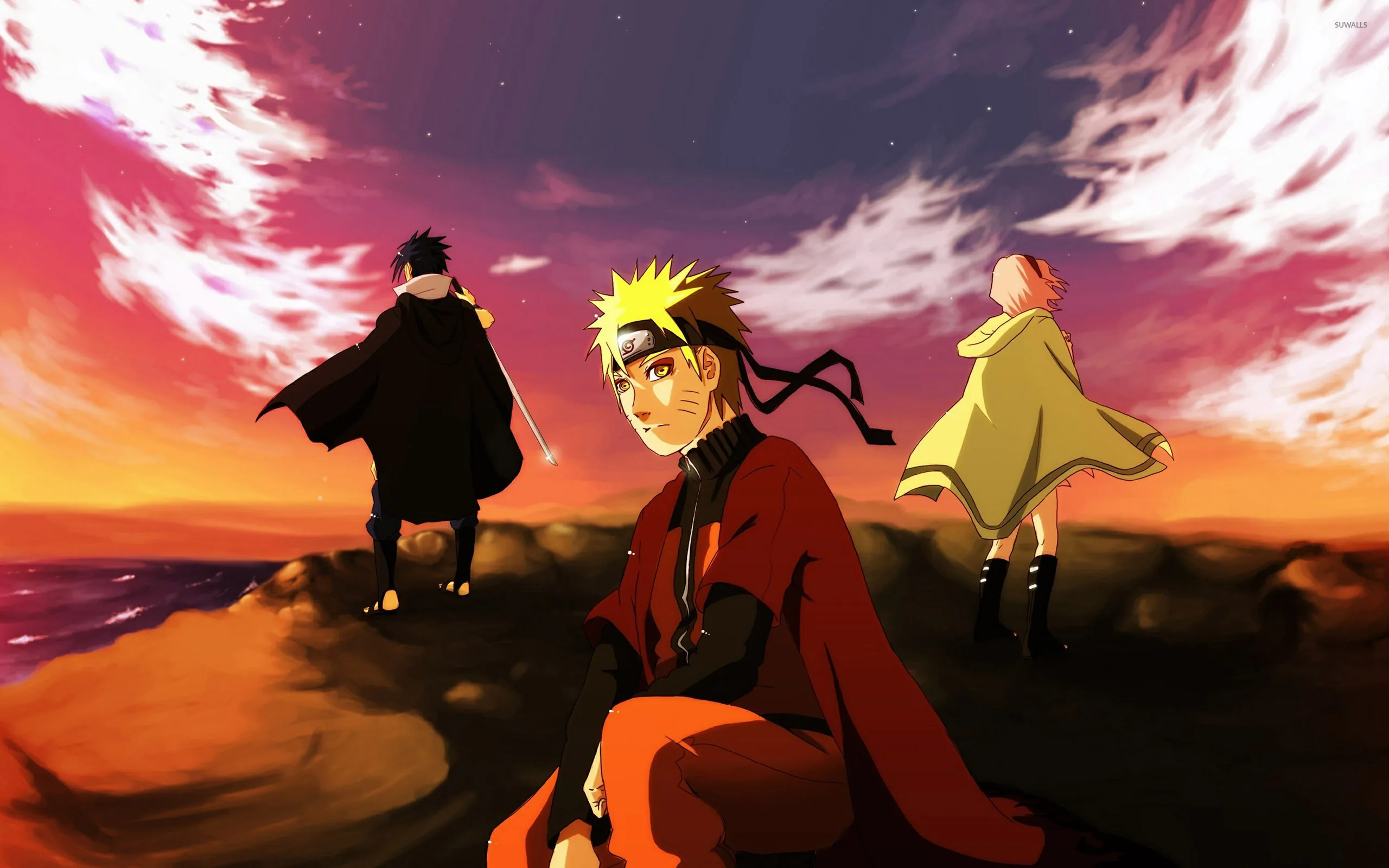 Sage Mode Naruto sits in his red coat while Sasuke and Sakura stand on outcrops behind him, all three lit by a streaked violet sunset.