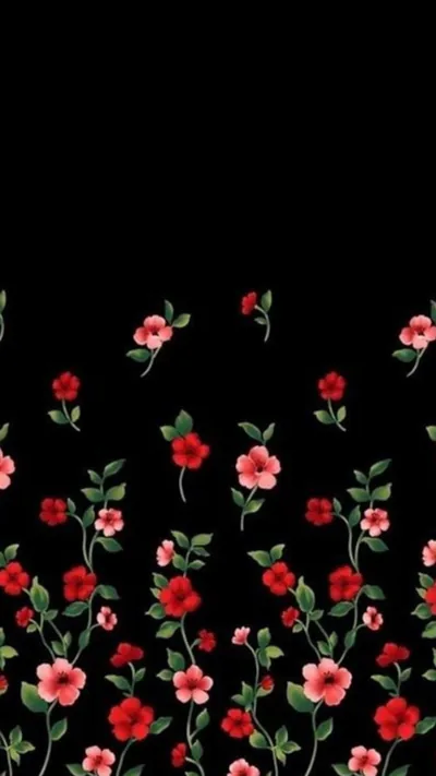 Slender vines of red and pink blossoms climb from the bottom edge of a tall black panel, thinning out halfway up so the top stays clear.
