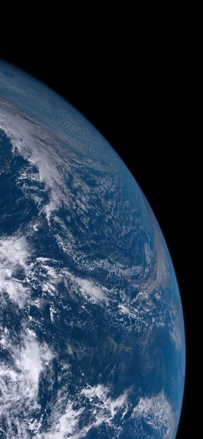 Ocean and thin cloud swirls fill the screen from the left, the globe's dark edge leaving a black margin down the right side for icons.