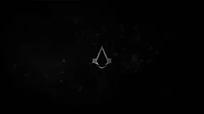 The pointed assassin crest floats dead centre in black, ringed by drifting dust motes lit just enough to read against the void.