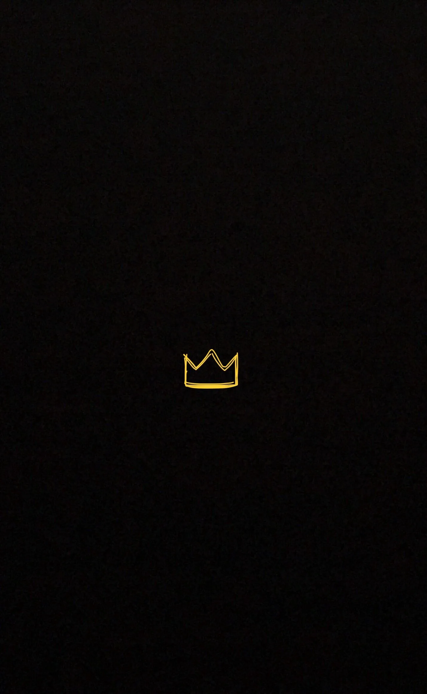A tiny gold crown outline sits just below centre on an otherwise empty black field — plenty of room left for the clock and icons.