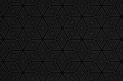 Interlocking six-point stars repeat across a matte black surface, embossed just enough to catch a low sidelight.
