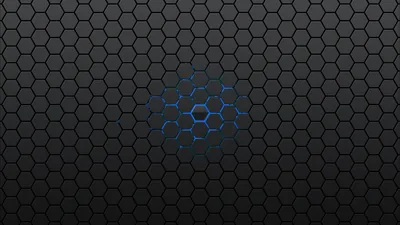 A honeycomb of dark hex tiles fills the frame, one small cluster near the centre lit from beneath in cold blue.