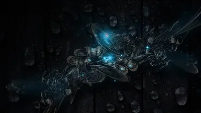 A tangle of metallic fronds and bubbles opens around a bright cyan core, the rest of the dark panelled backdrop left almost unlit.
