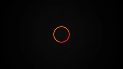 A single glowing ring sits slightly above centre on an empty black field, its light fading a few pixels out.