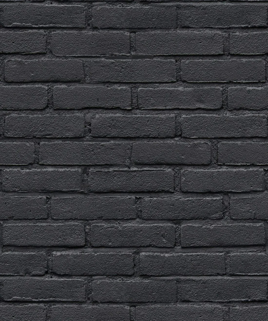 A tidy repeating brick print in charcoal and grey, each block edged with a pale rim so the running-bond pattern stays crisp across the frame.