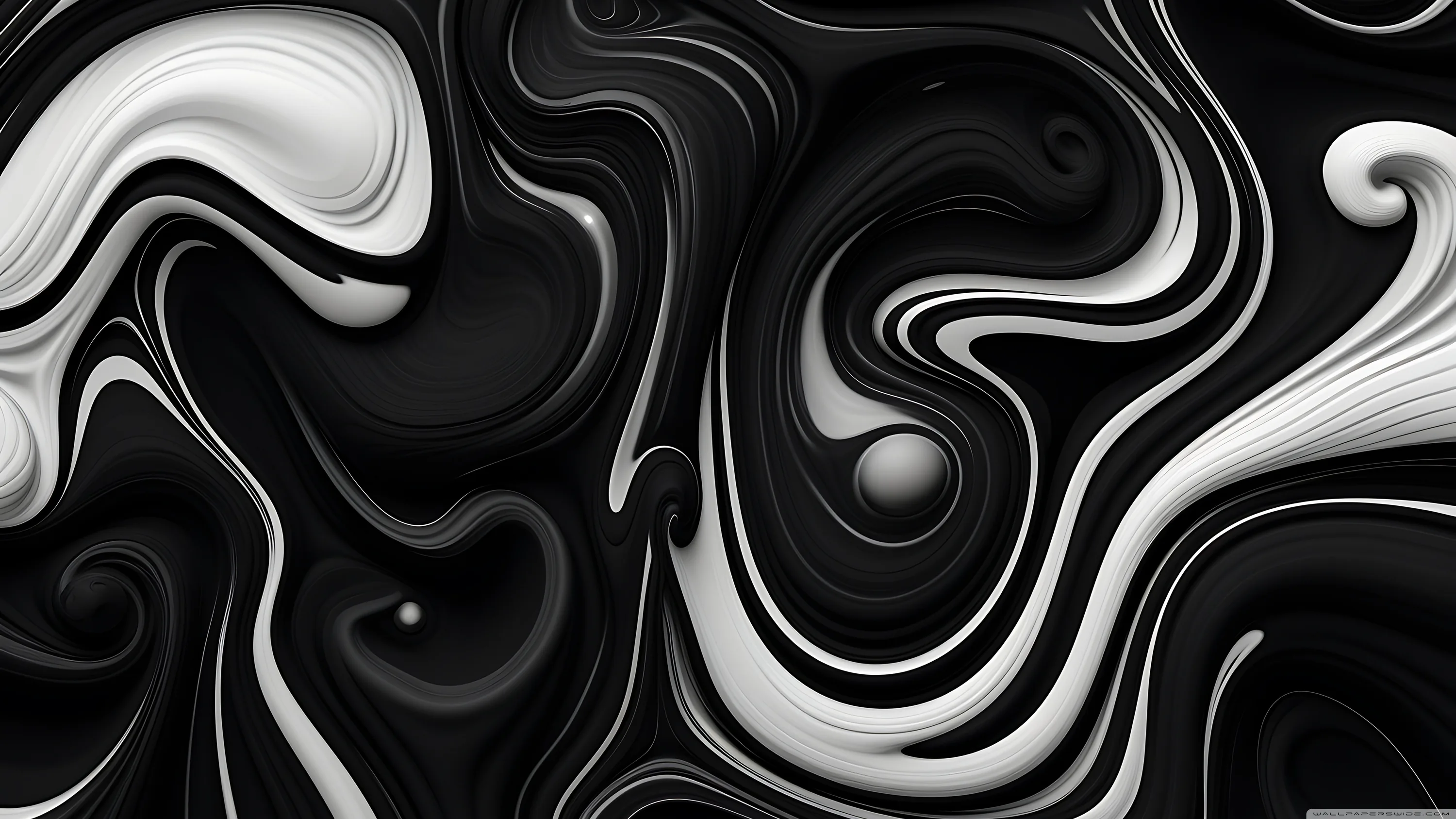 Thick black and white paint folds into each other in tight spirals, the contrast staying hard right across the frame.