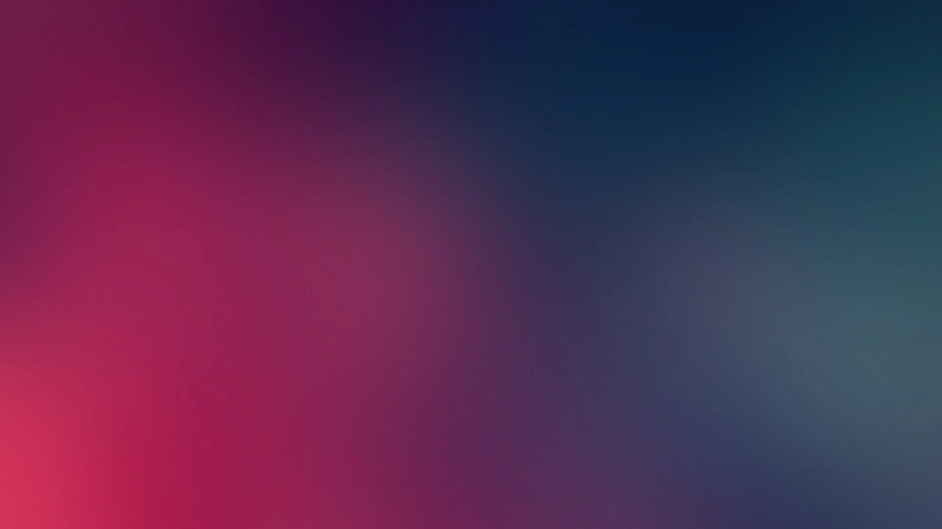 A blurred crimson and magenta haze presses in from the left while the rest dissolves into deep navy, dark enough on the right for white icons or a clock.