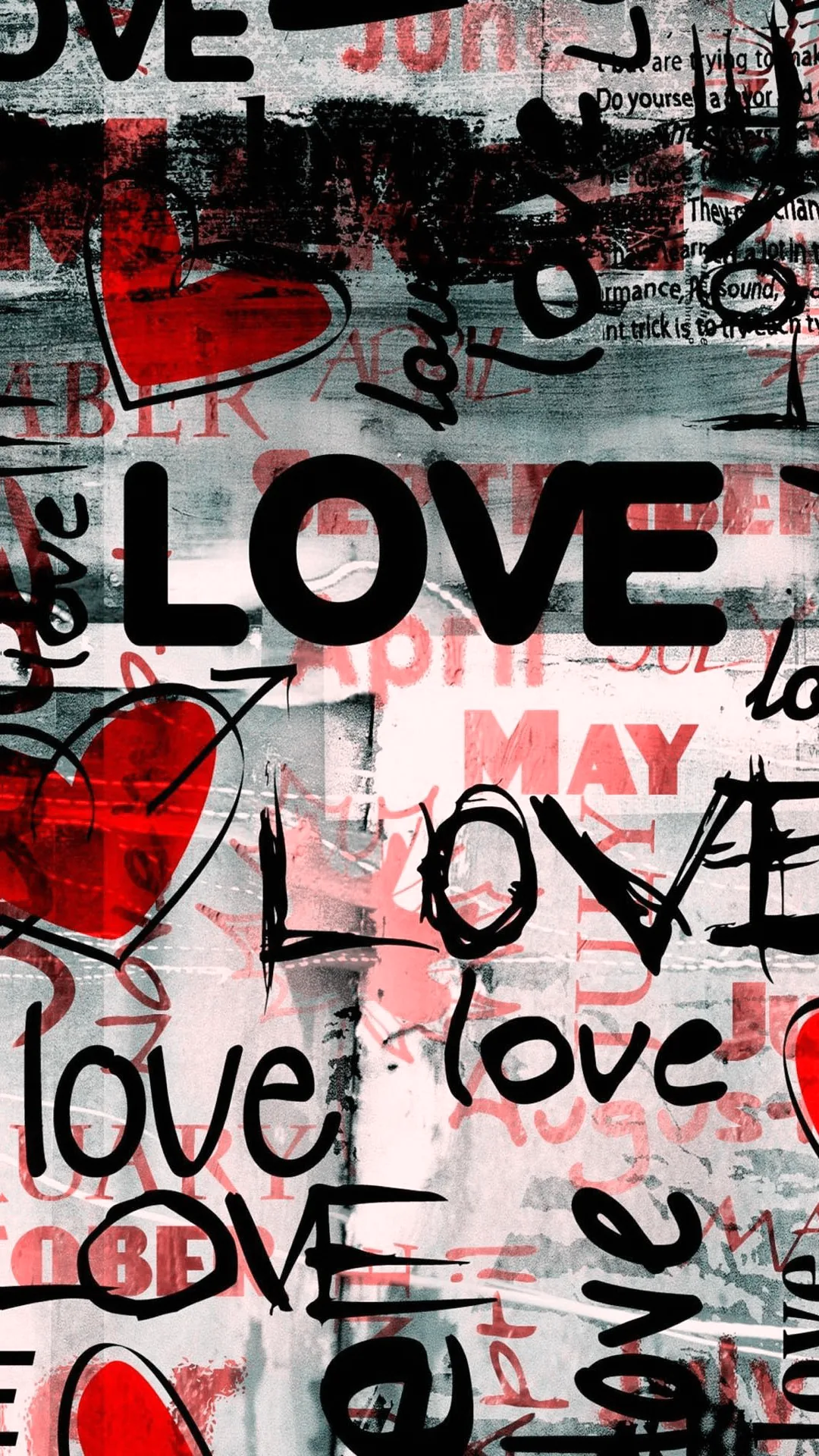 Layers of painted and printed love in black and red cover a scratched white wall, hearts filling the gaps between the words.