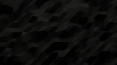 Angular blocks lean diagonally across the frame in barely separated blacks, readable only where one edge catches the light.
