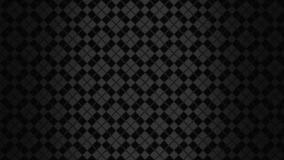 Small tilted squares repeat in two shades of grey across black, the tone lifting slightly toward the centre of the frame.