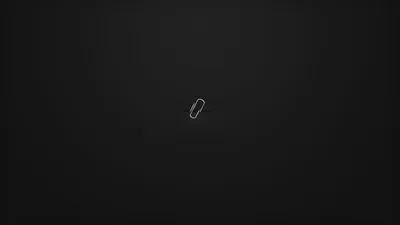 A tiny hand-drawn outline sits alone at the centre of a softly lit charcoal gradient, the corners falling away to near black.