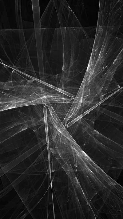 Fine white splinters radiate from a break point in the lower middle, thin sheets of light crossing each other over pure black.