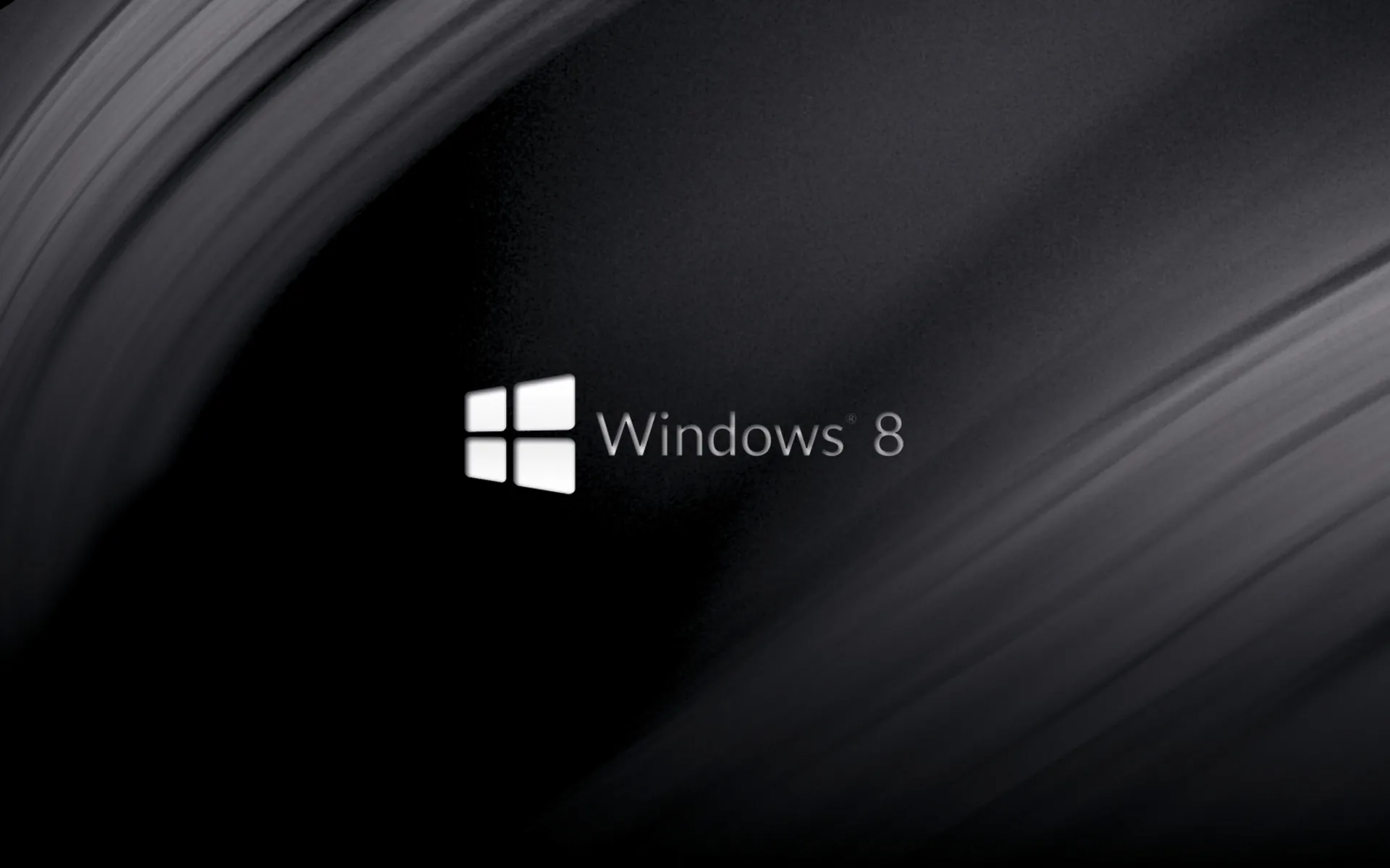 The white tilted mark and its name sit left of centre while broad grey curves sweep down the dark background behind them.