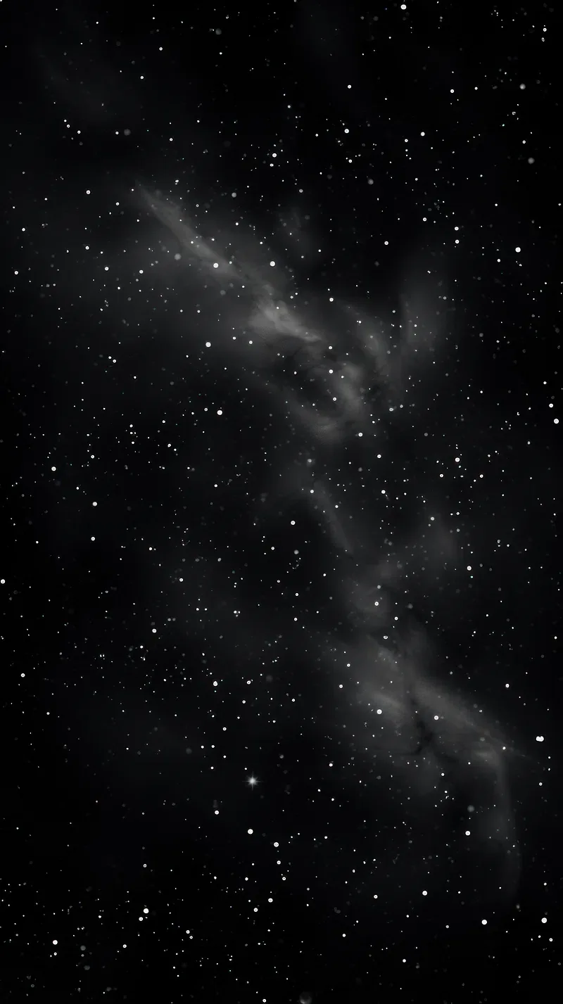 A pale band of nebula gas runs corner to corner down a tall black frame, pinpoint stars scattered thinly on either side of it.