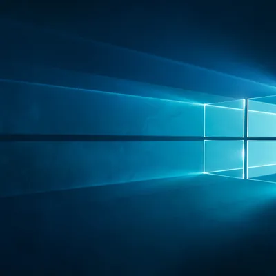 A large window outline stands in blue space with light beams streaking away from it in both directions.