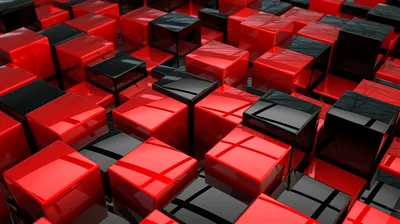 Stacked reflective cubes in red and black fill the frame at an angle, every face catching a hard highlight from above.