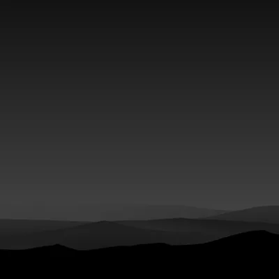 A square crop of soft charcoal sky fading down to overlapping hill silhouettes, the darkest shapes tucked into the bottom corners.