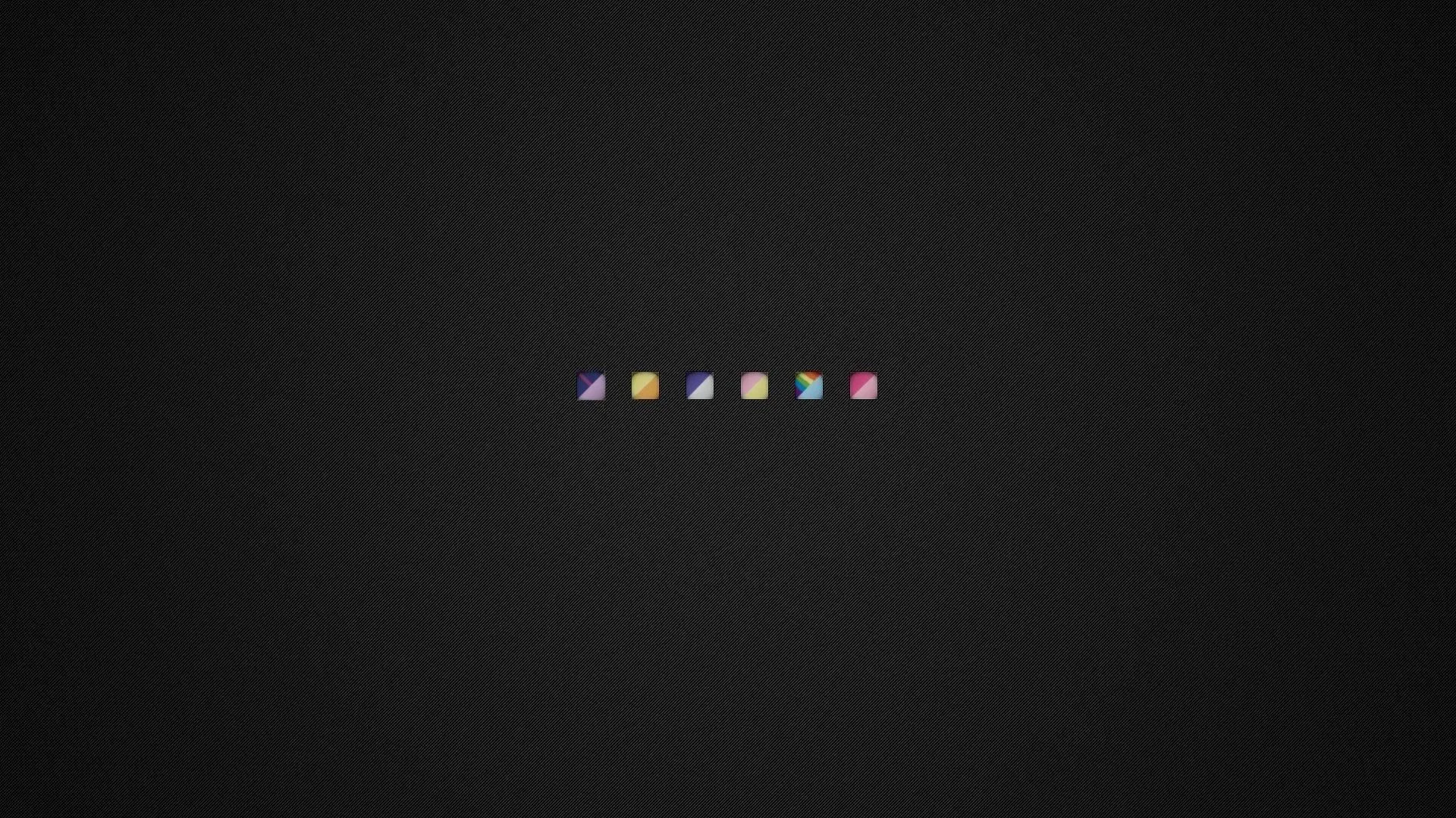 A single row of six small colourful folder icons sits dead centre on a softly vignetted charcoal background, everything else left empty.