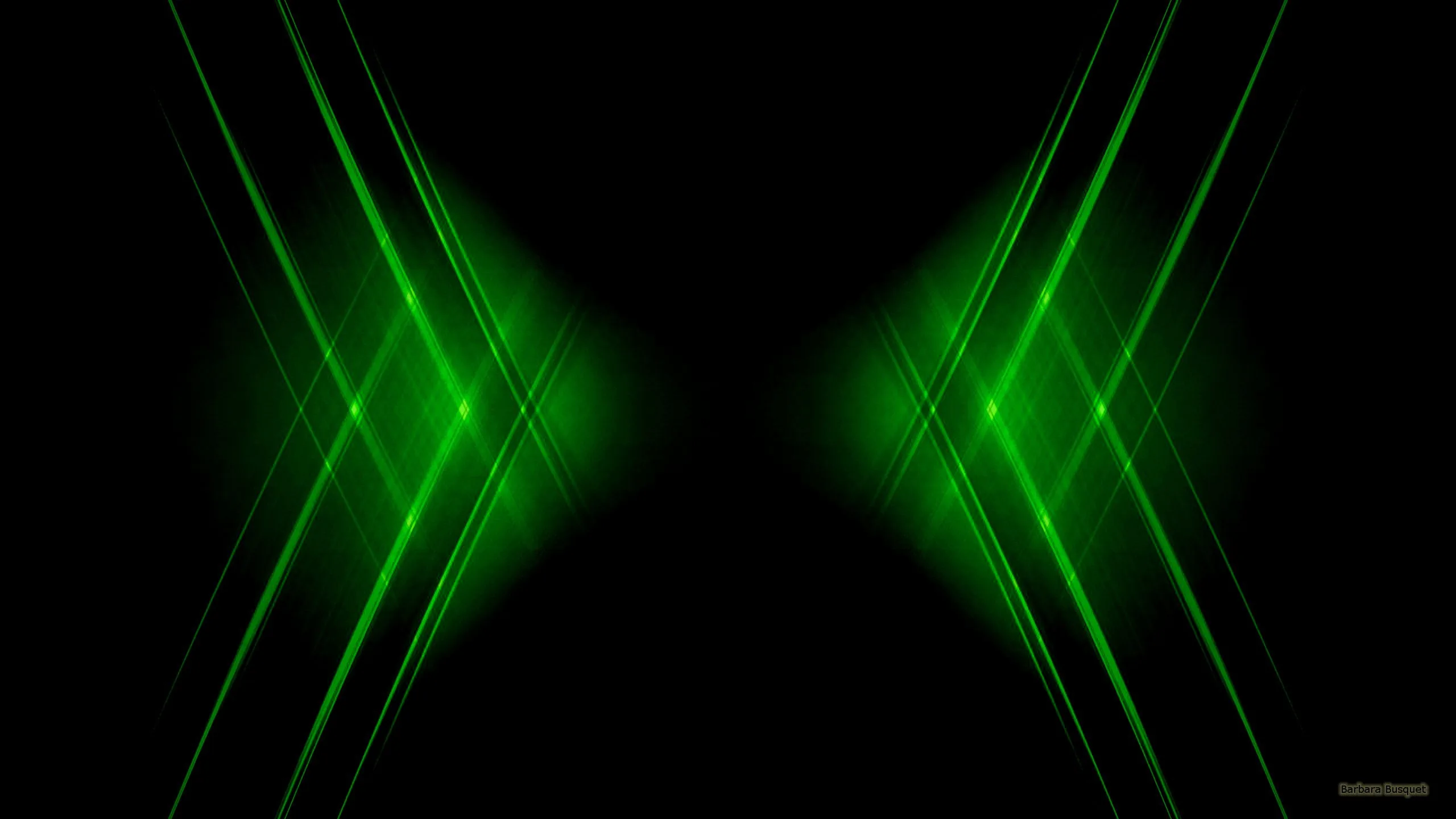 Sharp green beams cross and mirror from both sides toward the centre, leaving the top and bottom of the frame in darkness.