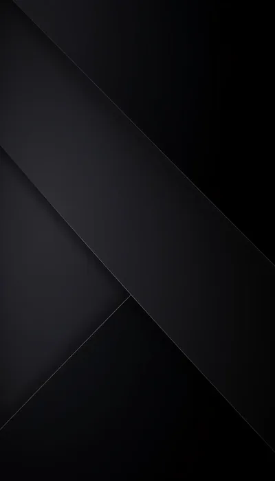 Large sheets of matte black overlap on the diagonal, each crease picked out by a hairline of grey and the bottom left corner left completely flat.