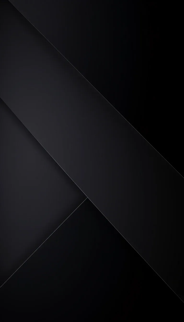 Large sheets of matte black overlap on the diagonal, each crease picked out by a hairline of grey and the bottom left corner left completely flat.