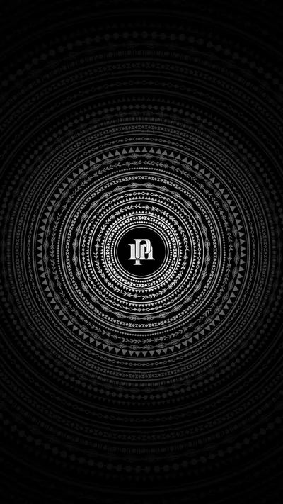 Rings of small dots and dashes ripple outward from a tiny white emblem at the centre, everything else charcoal on black.