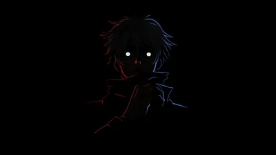 A boy's white glowing eyes and a thin red rim light are all that separate him from the black field filling this widescreen frame.