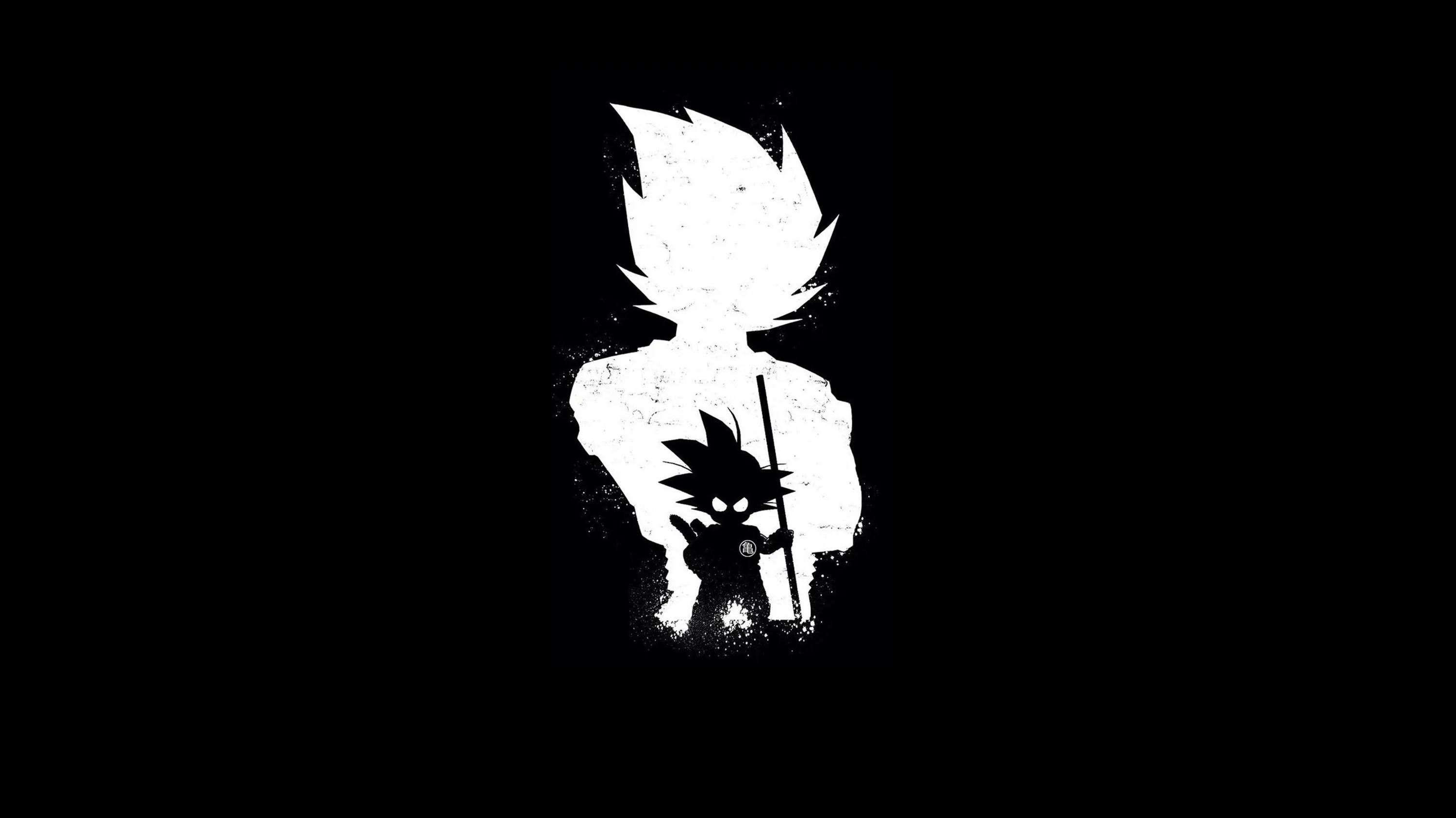 Small Goku with his power pole stands centred, his adult super saiyan form rising behind him as a soft white silhouette on pure black.