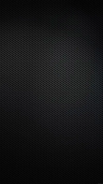 A woven carbon fibre pattern repeats edge to edge, the tiny diagonal cells picking up just enough light to show the weave.