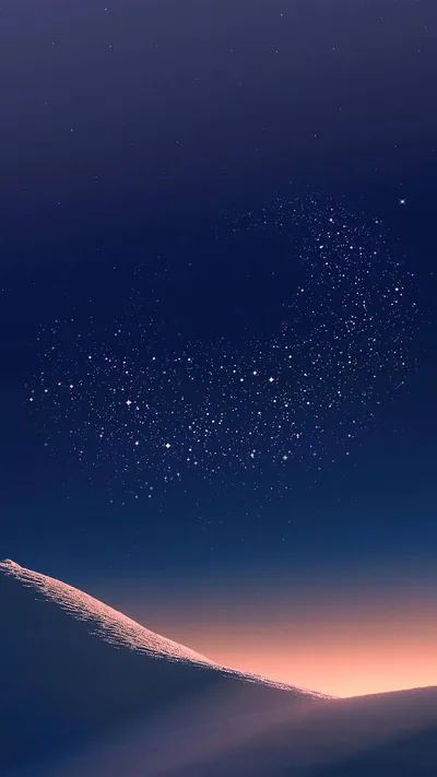 A loose cluster of stars hangs in an indigo sky above a smooth dune ridge in the lower left, its crest lit peach from behind.