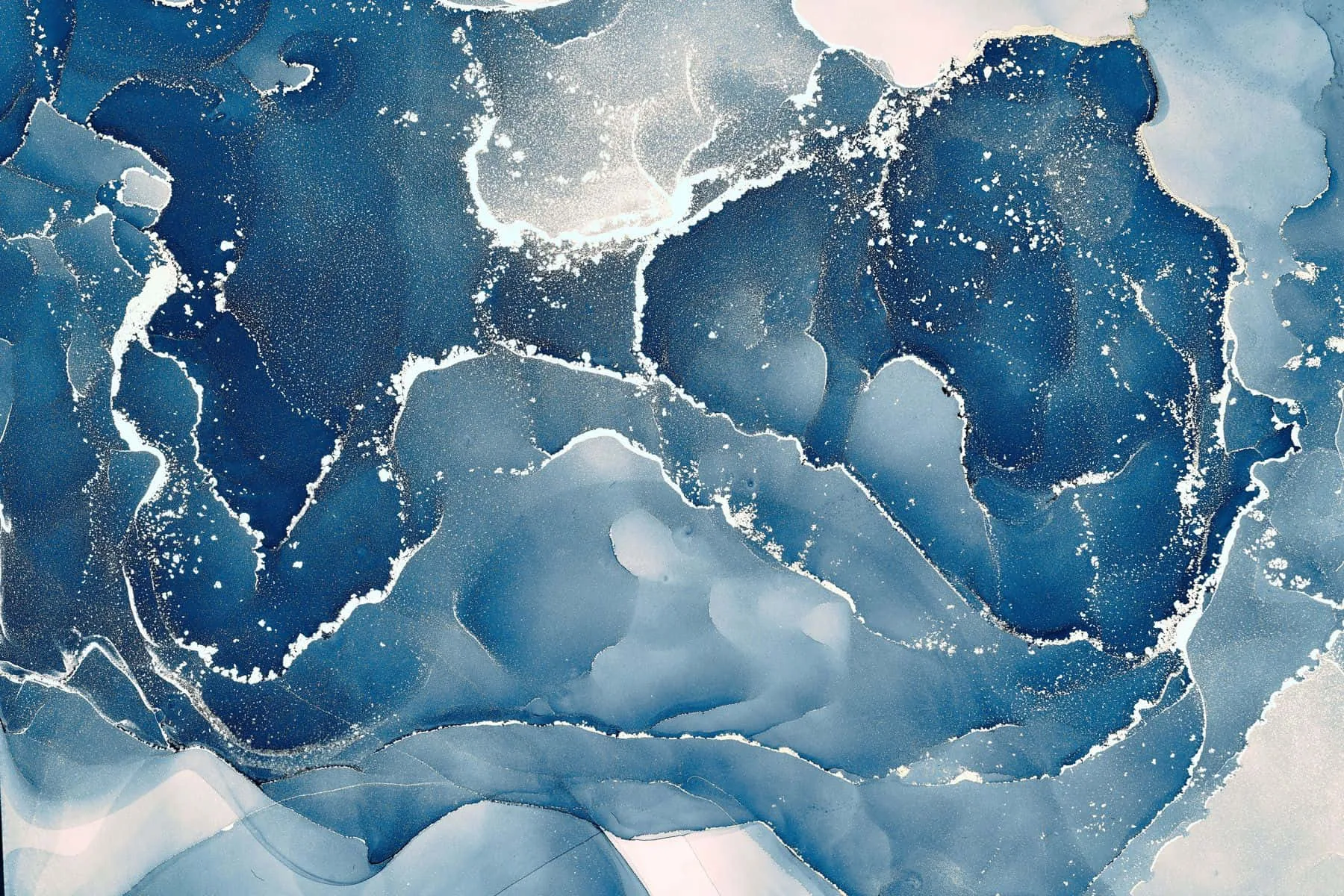 Two deep ocean ink blooms edged in fine gold lines spread over a frost white ground, the lower band smoothing into pale waves with room for text.