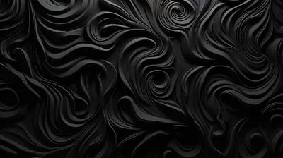 Deep swirling grooves are cut into a black surface, the raised ridges catching light along their tops.