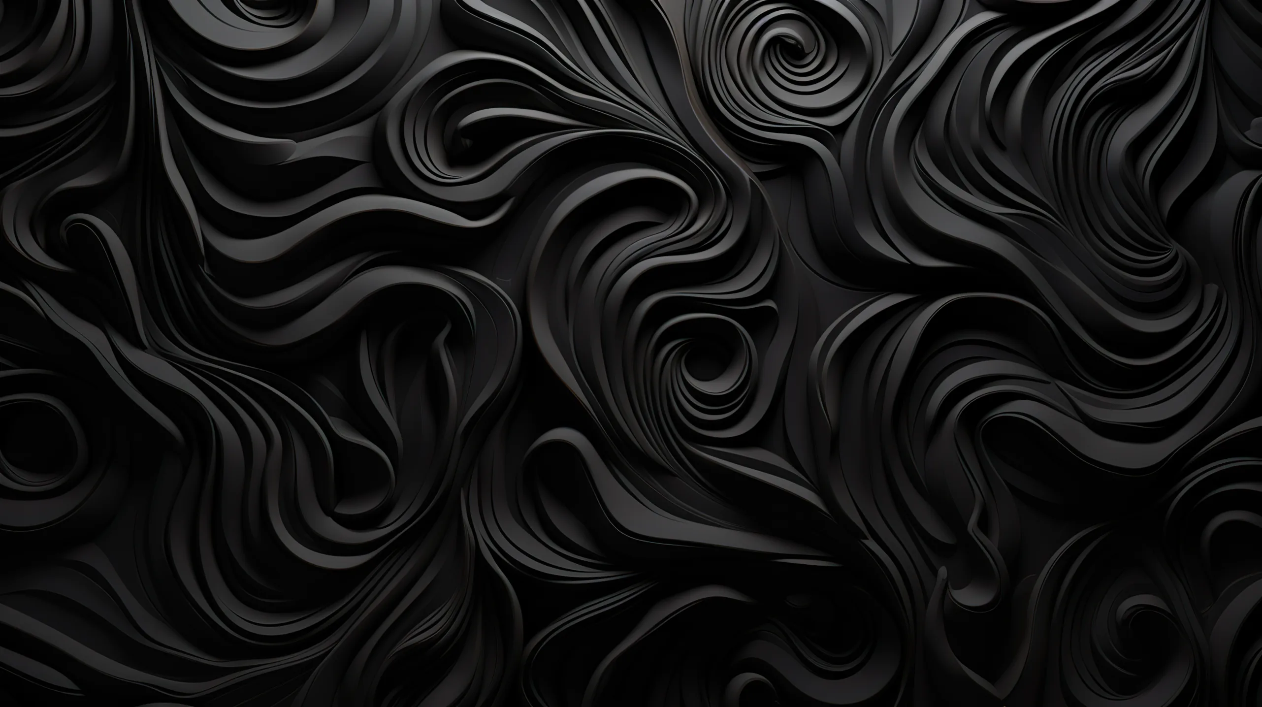 Deep swirling grooves are cut into a black surface, the raised ridges catching light along their tops.