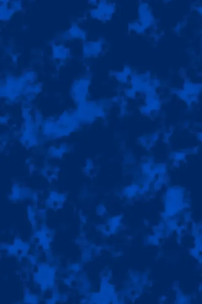 Patches of bright cobalt drift over a darker navy ground like inky clouds, an even all-over texture with no single focal point.