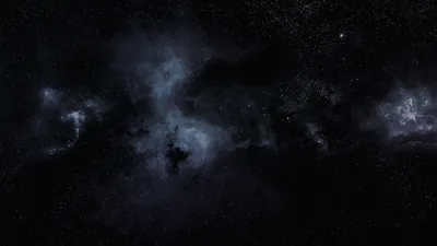 Low-contrast gas sits against black space with only a handful of bright stars breaking through, most of the frame left almost fully black.