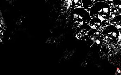 High contrast grunge texture with a cluster of bubble shapes in the top right corner, one tiny red mark near the bottom, the rest solid black.