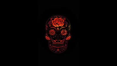 A decorated skull glows in deep red line work, roses filling the eye sockets while the background stays fully dark.