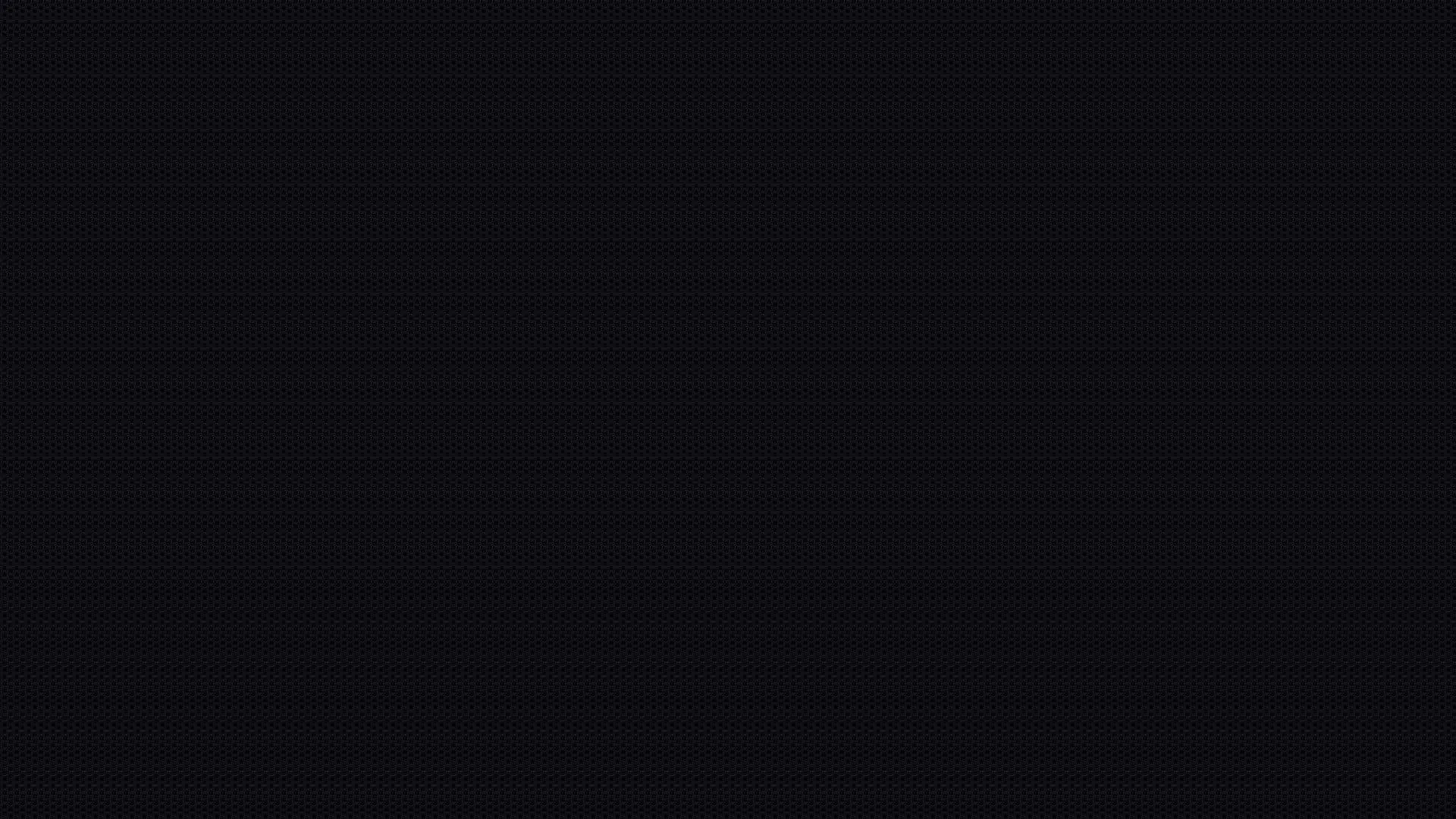 An unbroken dark surface carrying the slightest blue tint, with no texture, edge or focal point anywhere.