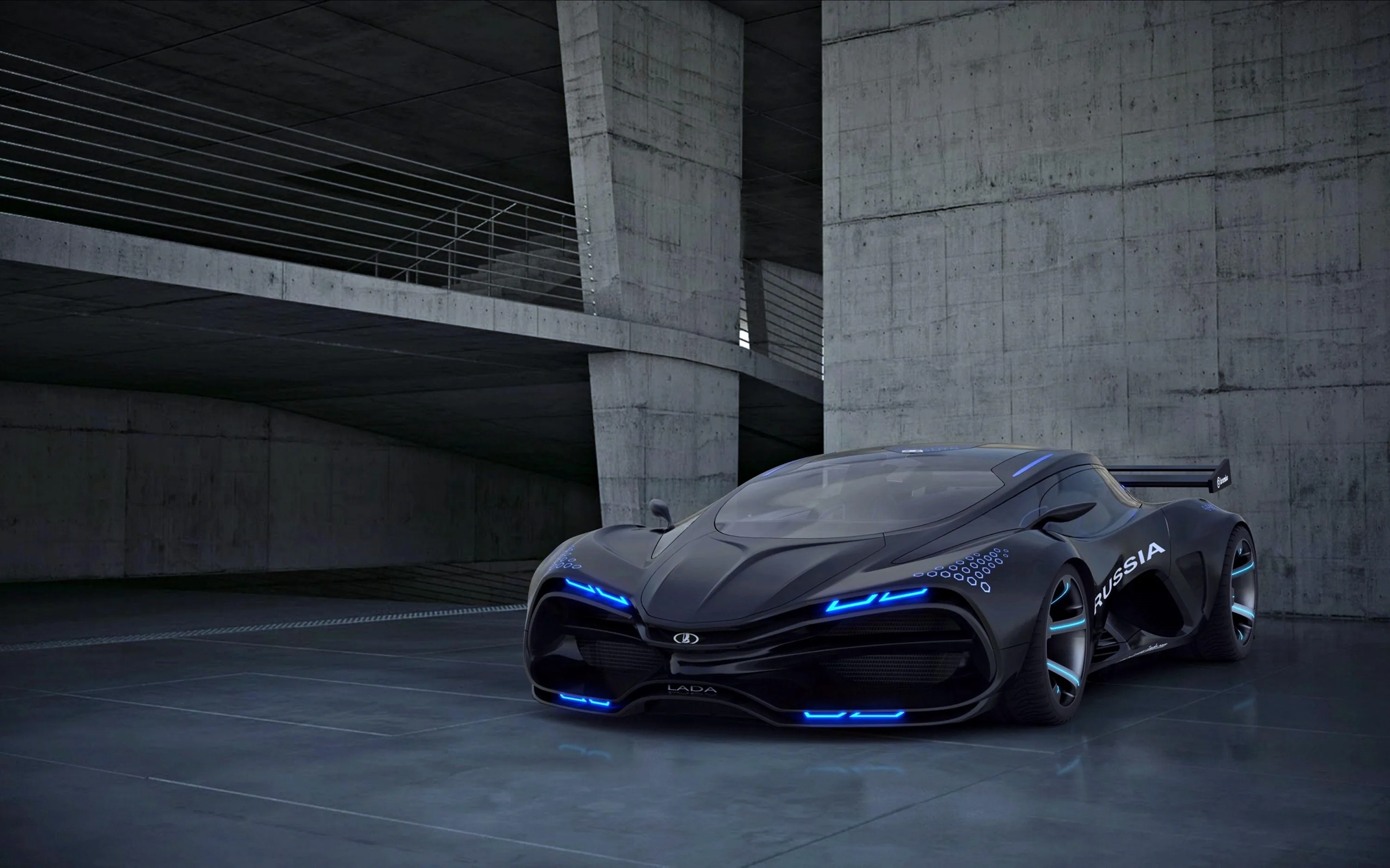 A wedge-shaped prototype in matte black stands under a concrete parking deck, electric blue light lines running the length of its sills, grille and wheels.