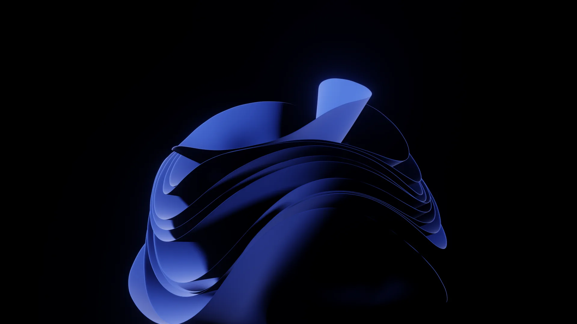 The Windows 11 bloom rendered in cobalt petals against black, lit from behind so the edges of each ribbon catch the light.