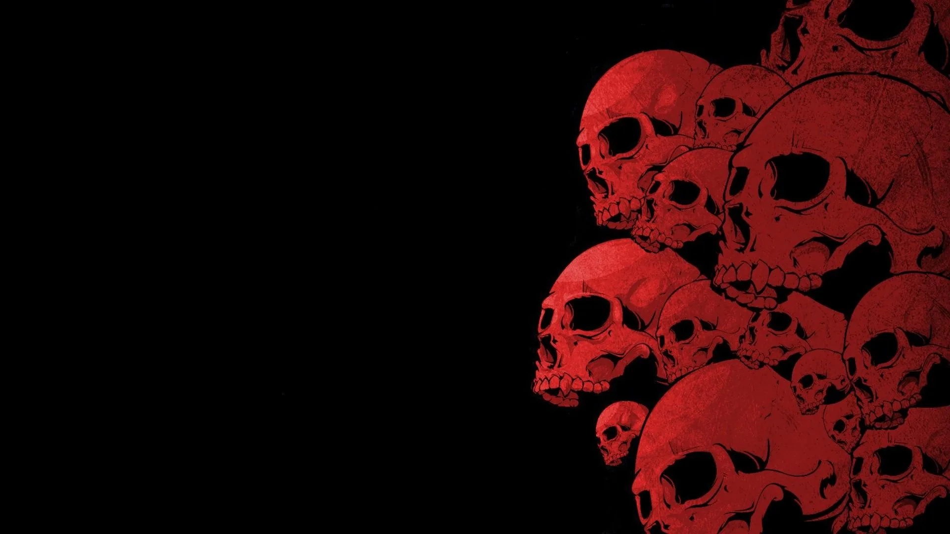 A stack of red skulls crowds the right side of the frame, jaws overlapping, while the left half stays flat black for icons.