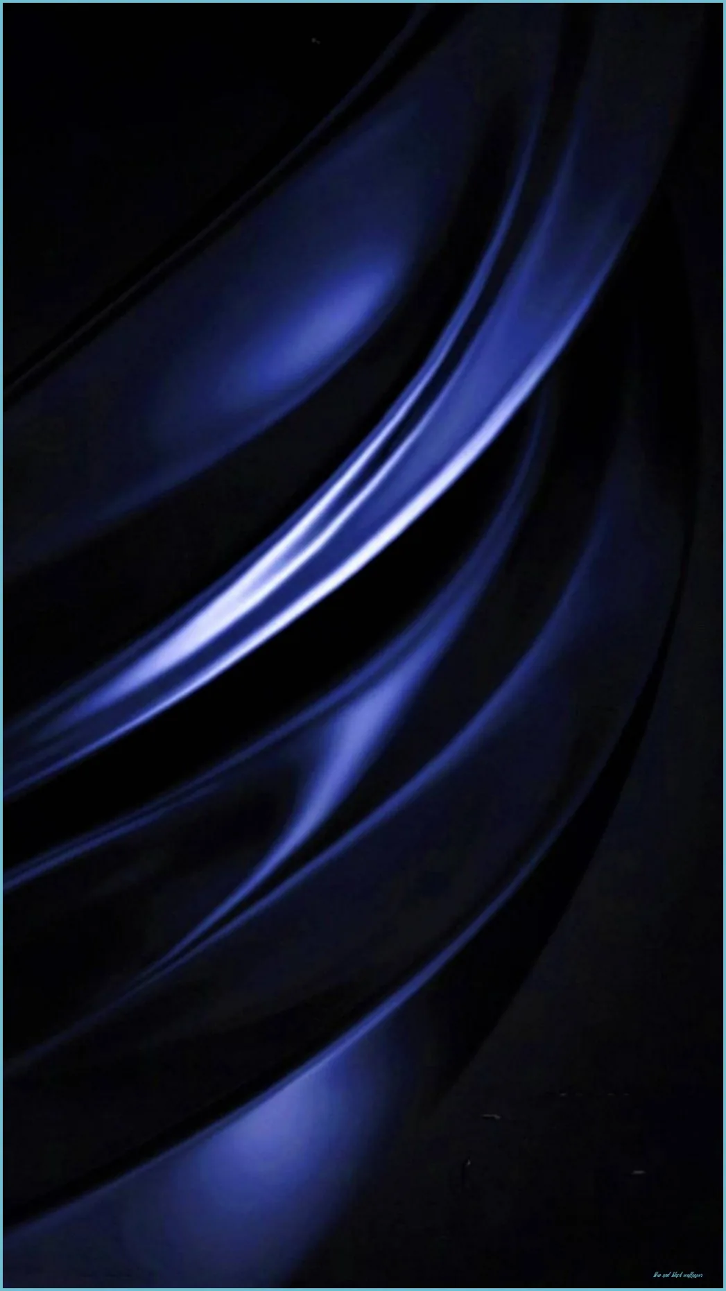 Broad folds of blue-black fabric sweep across the frame, one bright crease running diagonally while the corners fall away into shadow.